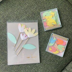 Meri Meri flower cake topper and birdie garland